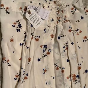 Cream, floral American Eagle pants.